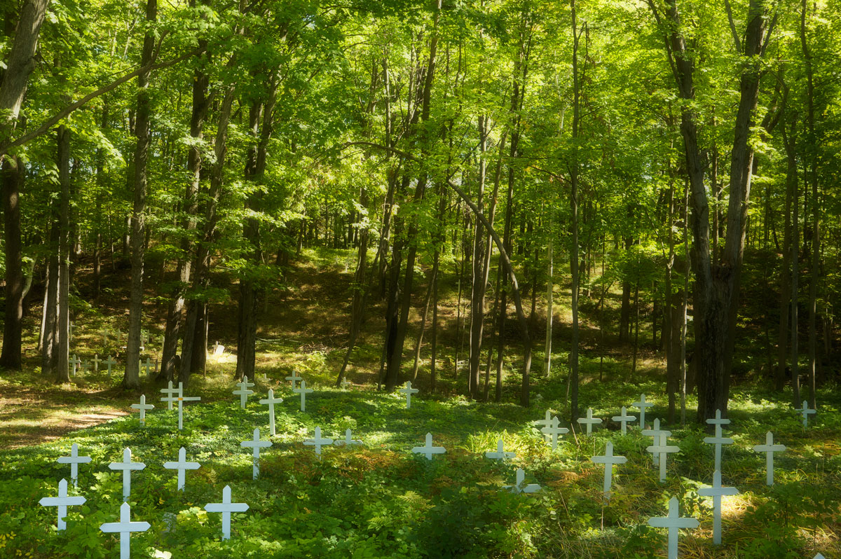 Photo of Grave markers at Greensky Hill Indian Methodist Church — Charlevoix, Michigan